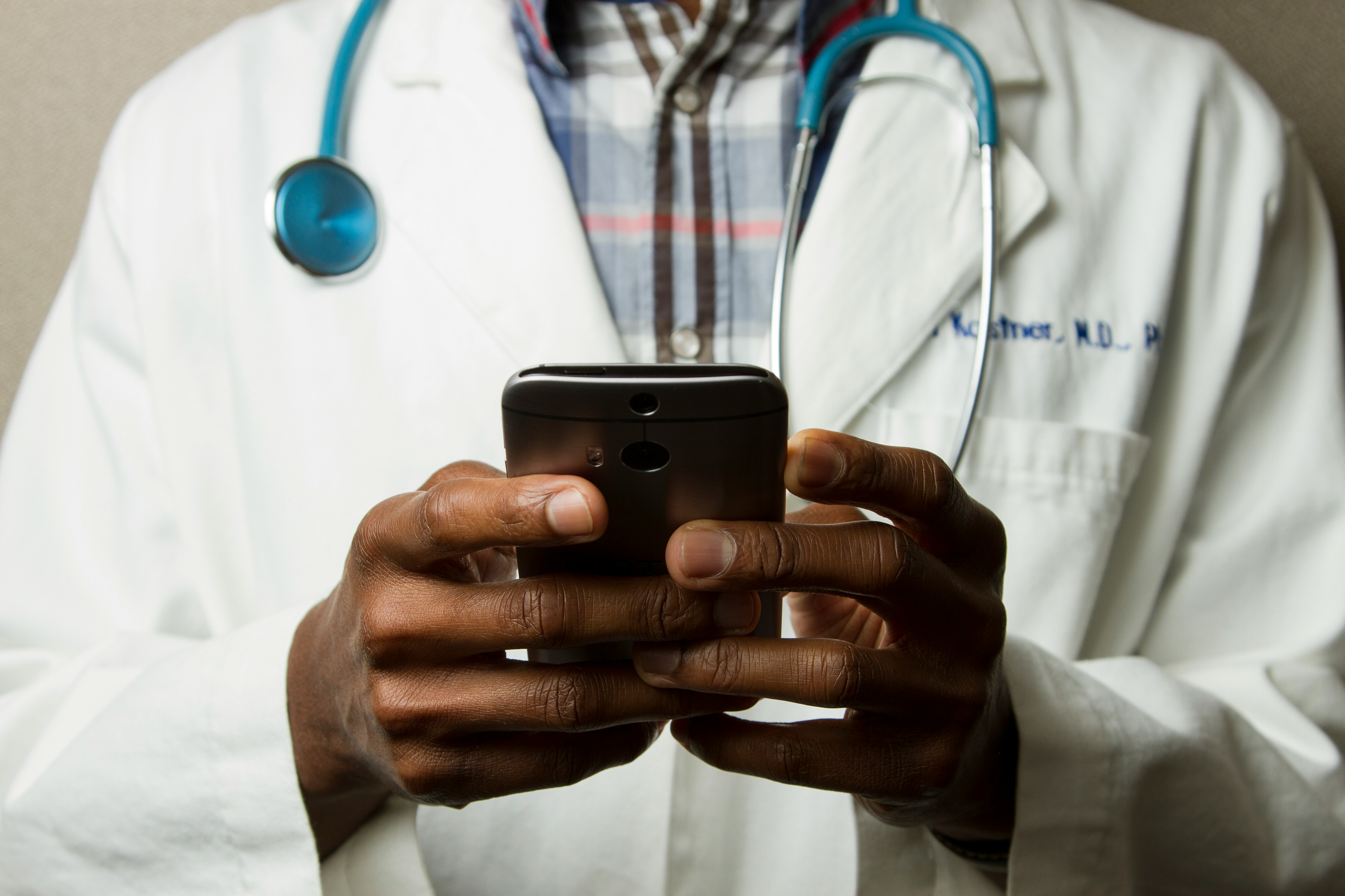 A clinician using AI assistance at the point of care